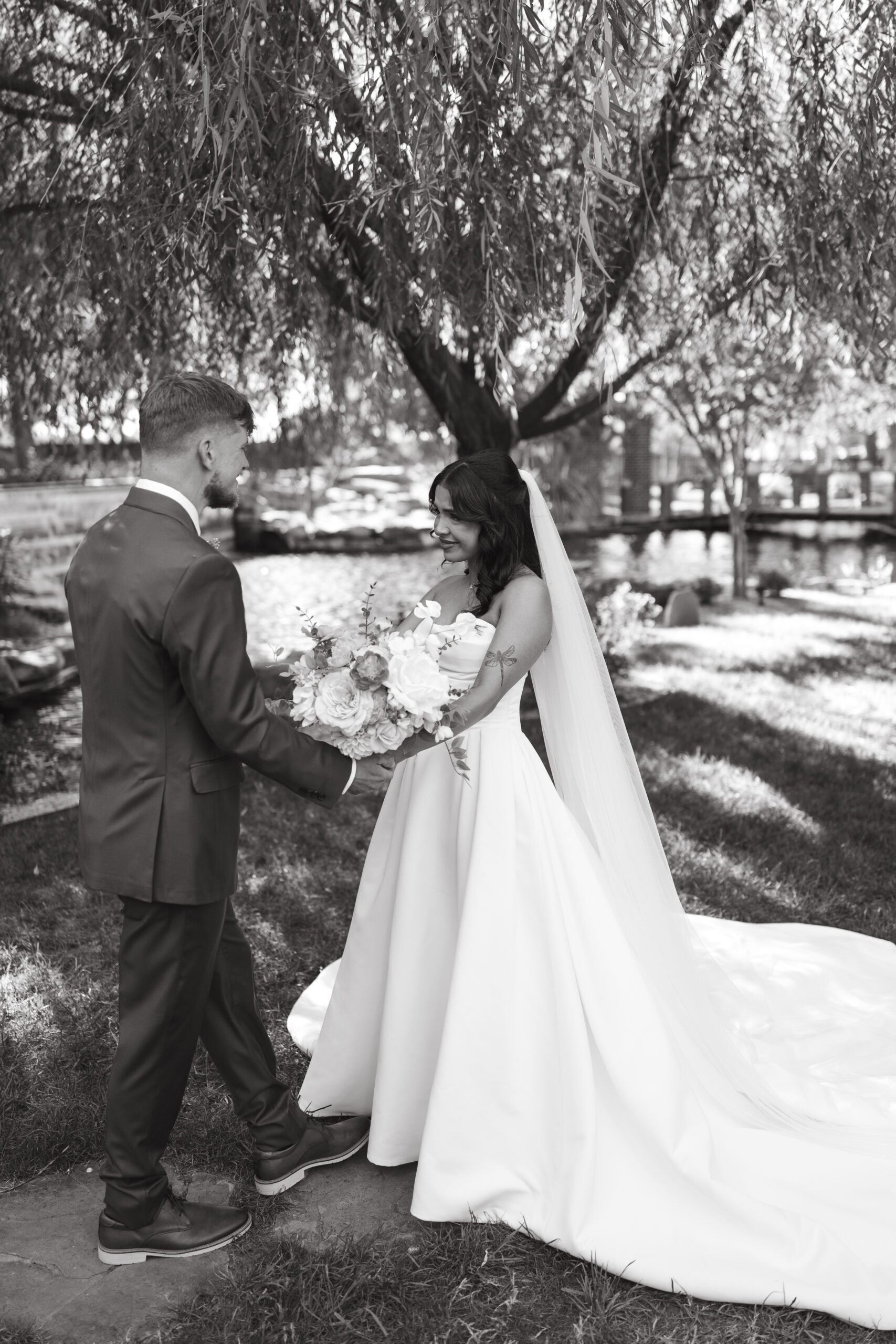 Candid moment captured by a Lubbock wedding photographer at the Willows Event Center