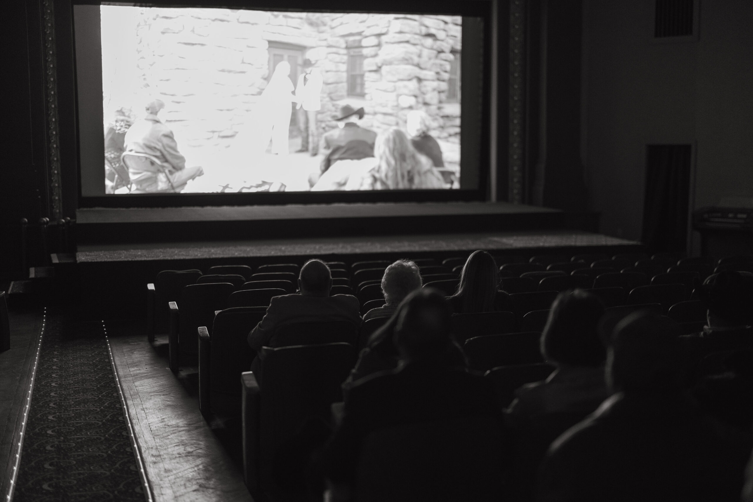 Private screening at the historic Luna Theater marquee in Clayton, New Mexico.