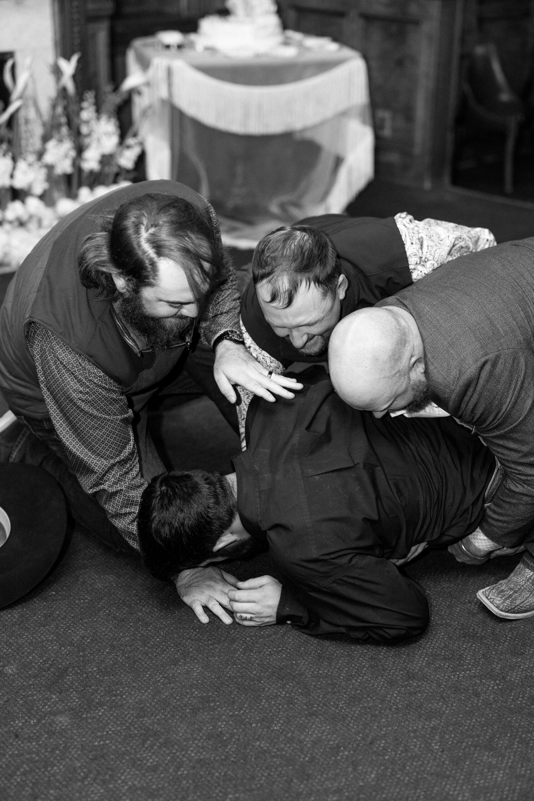 Traditional cowboy chapping at a Western wedding reception in New Mexico.