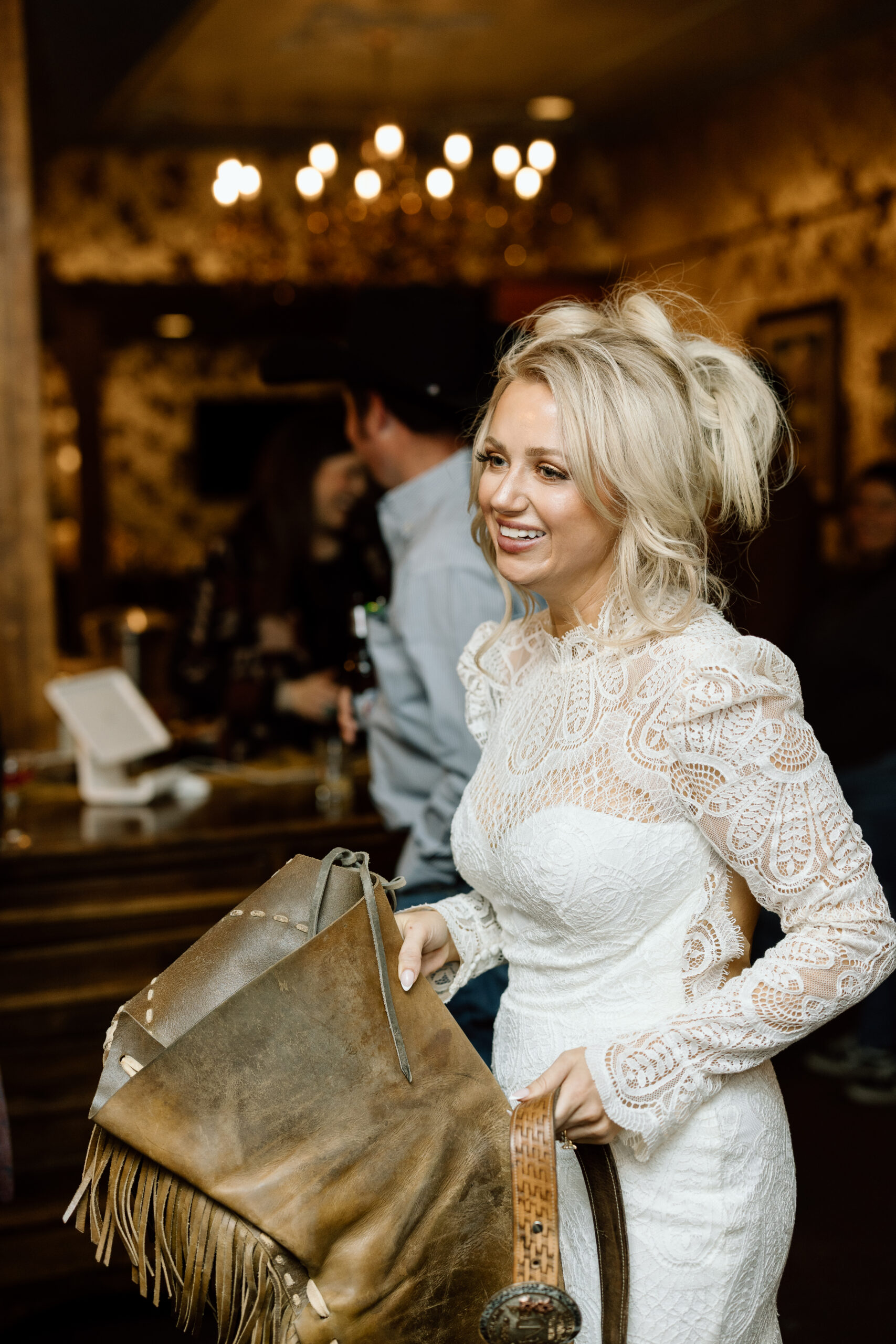 Traditional cowboy chapping at a Western wedding reception in New Mexico.