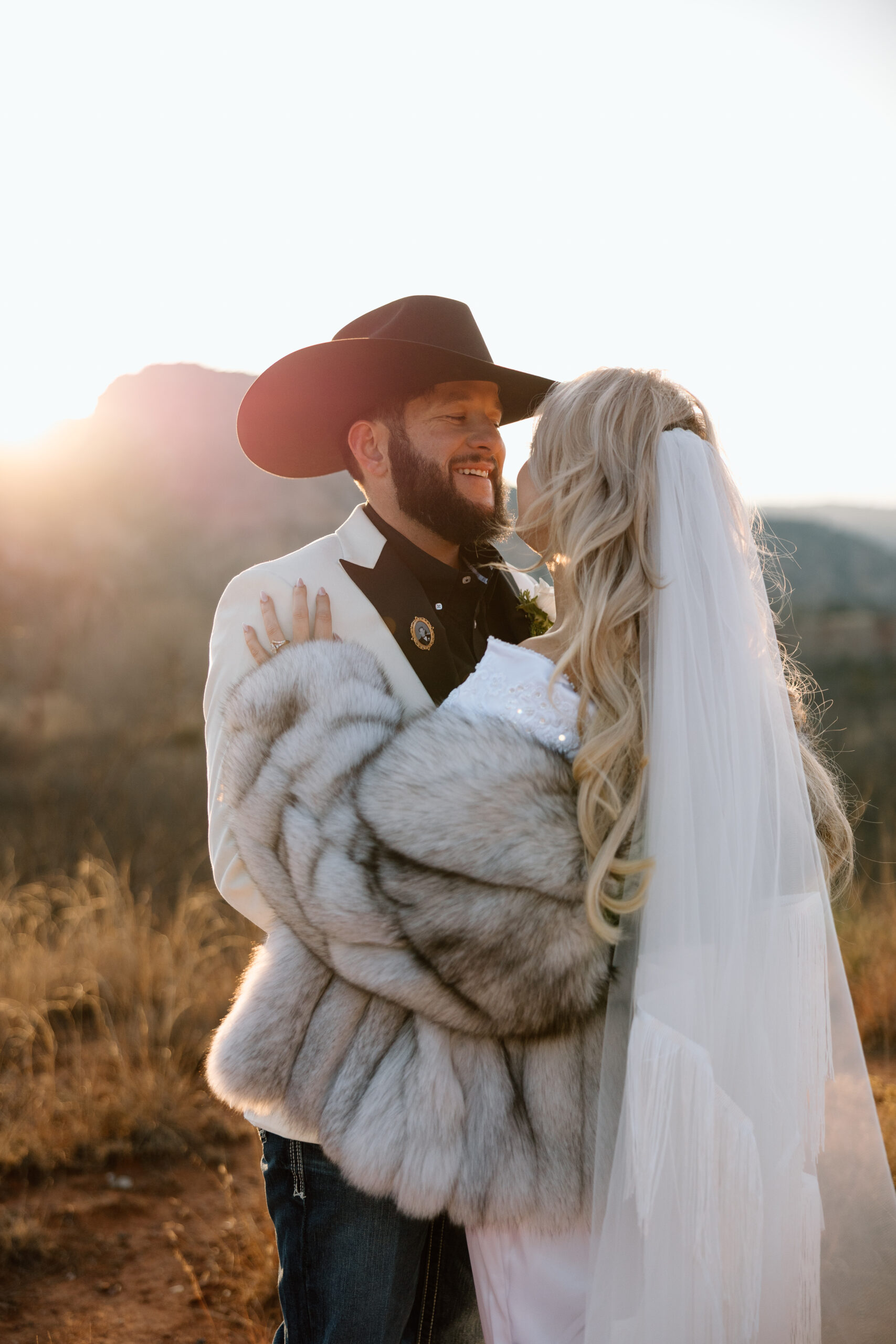 Romantic sunset elopement photo of a couple in the desert landscape of Palo Duro Canyon, Texas.