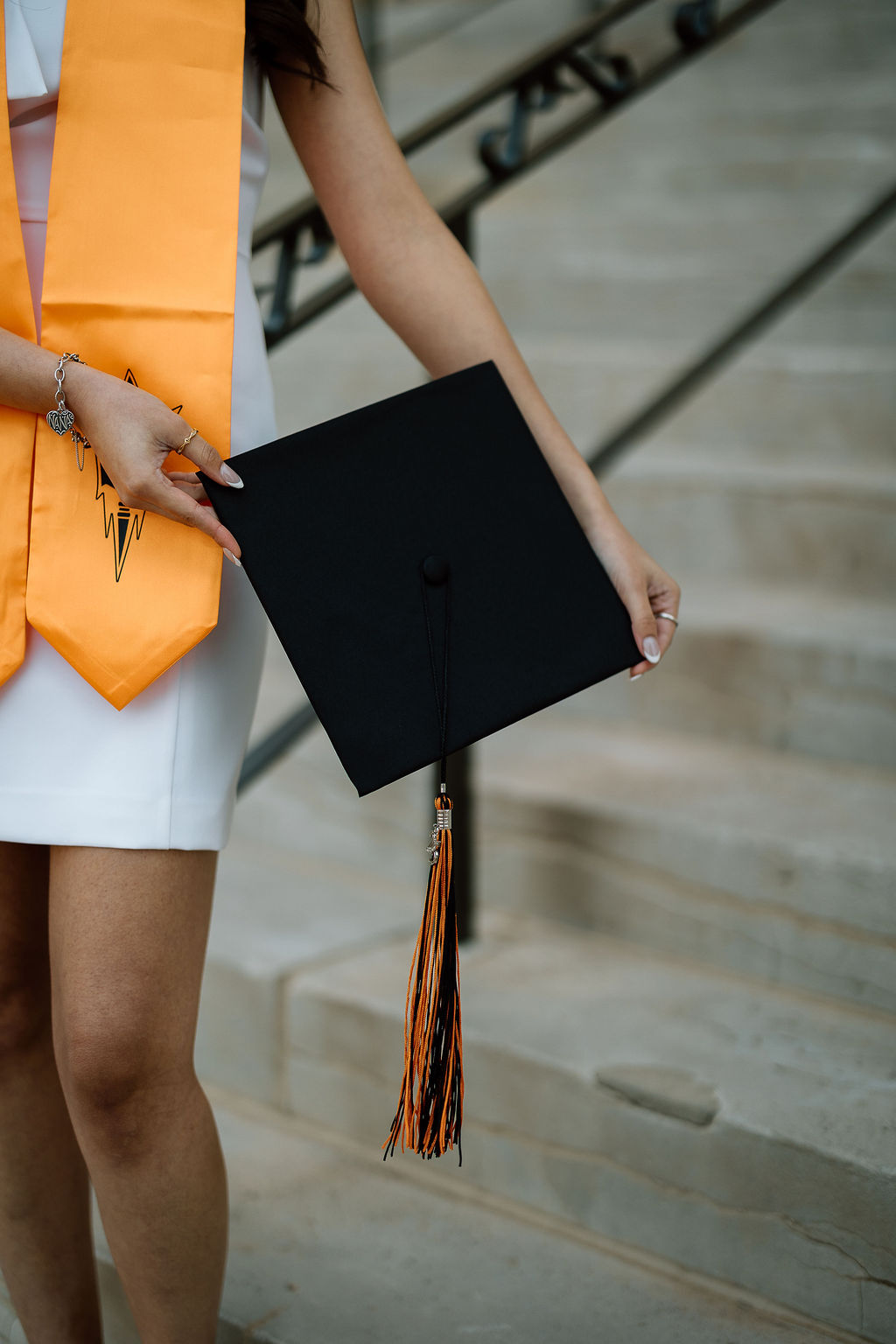 Senior portrait session in downtown Amarillo with graduation cap