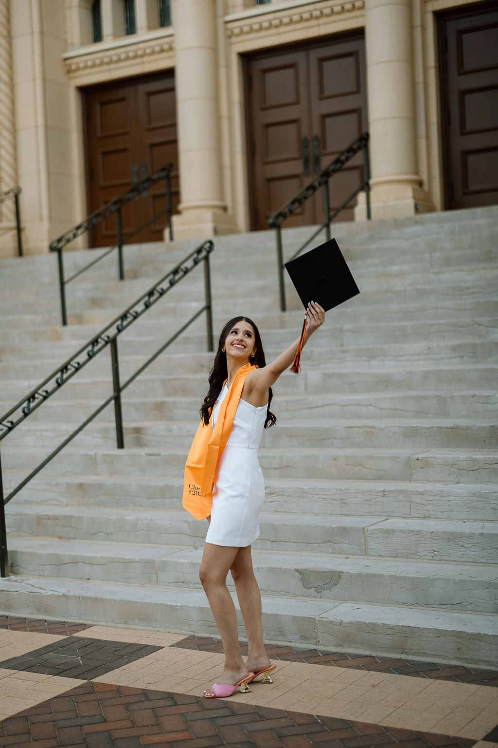 Senior portrait session in downtown Amarillo with graduation stole