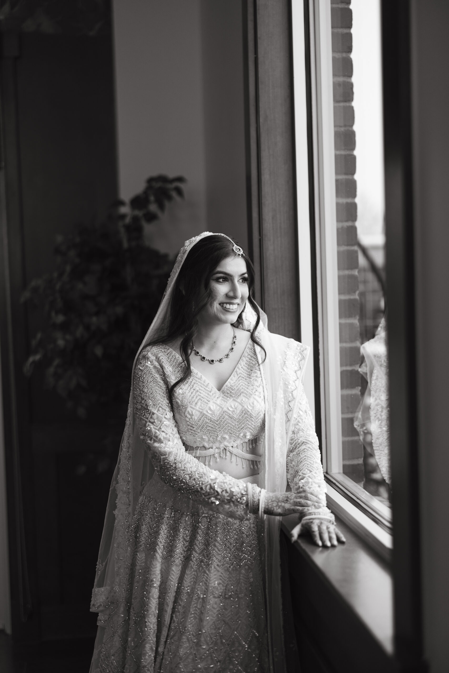 Bride in a silvery champagne wedding dress for a Denver celebration.