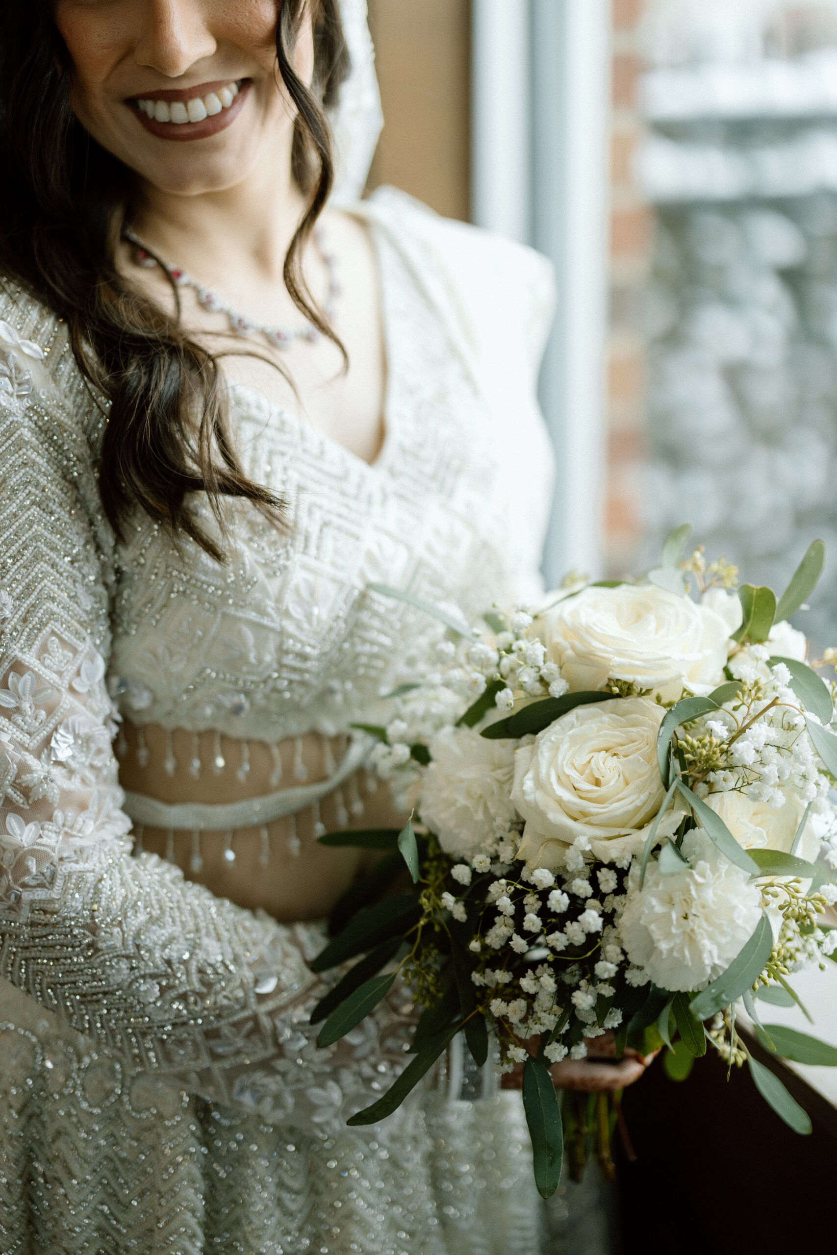Bride in a silvery champagne wedding dress for a Denver celebration.