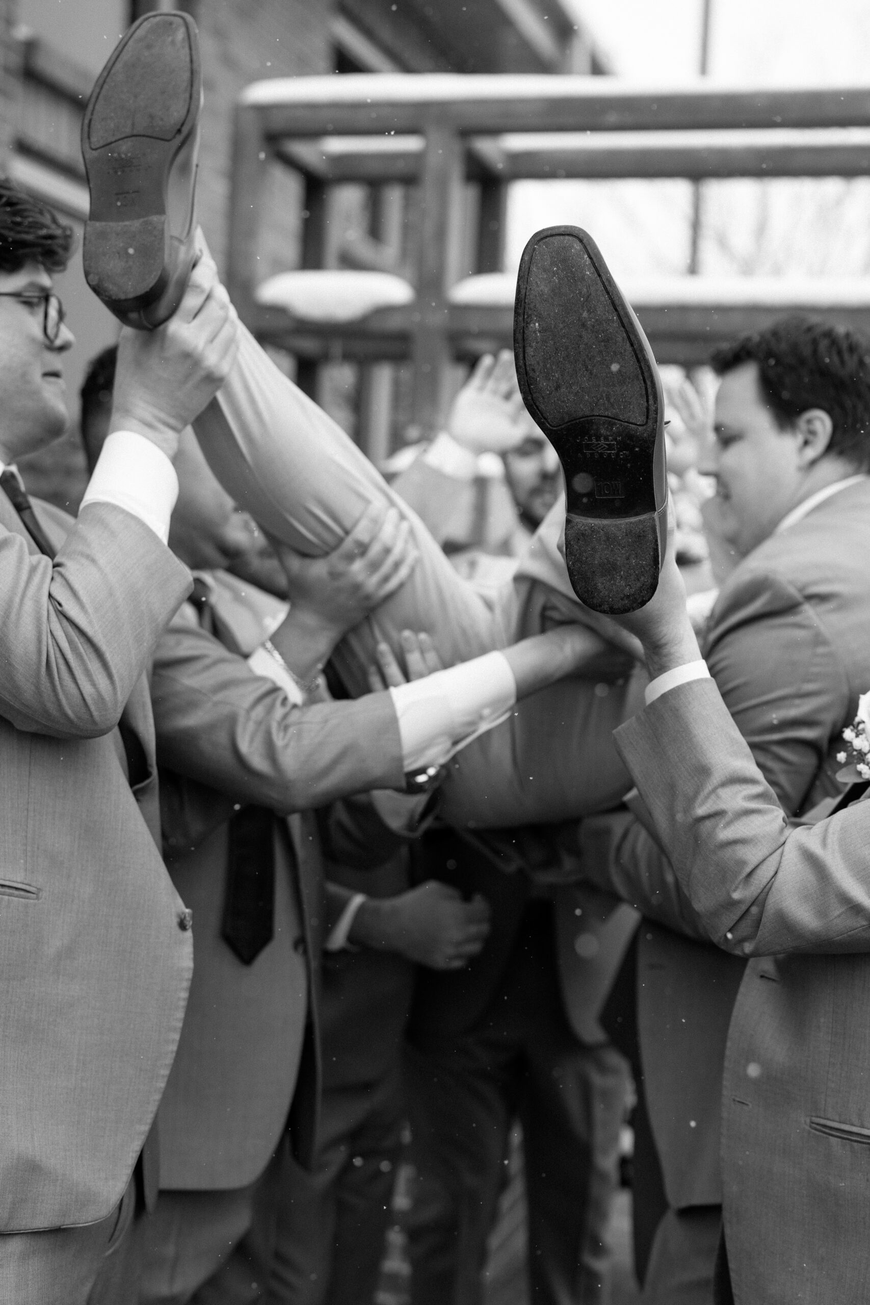 Fun, candid groomsmen photos in Denver.