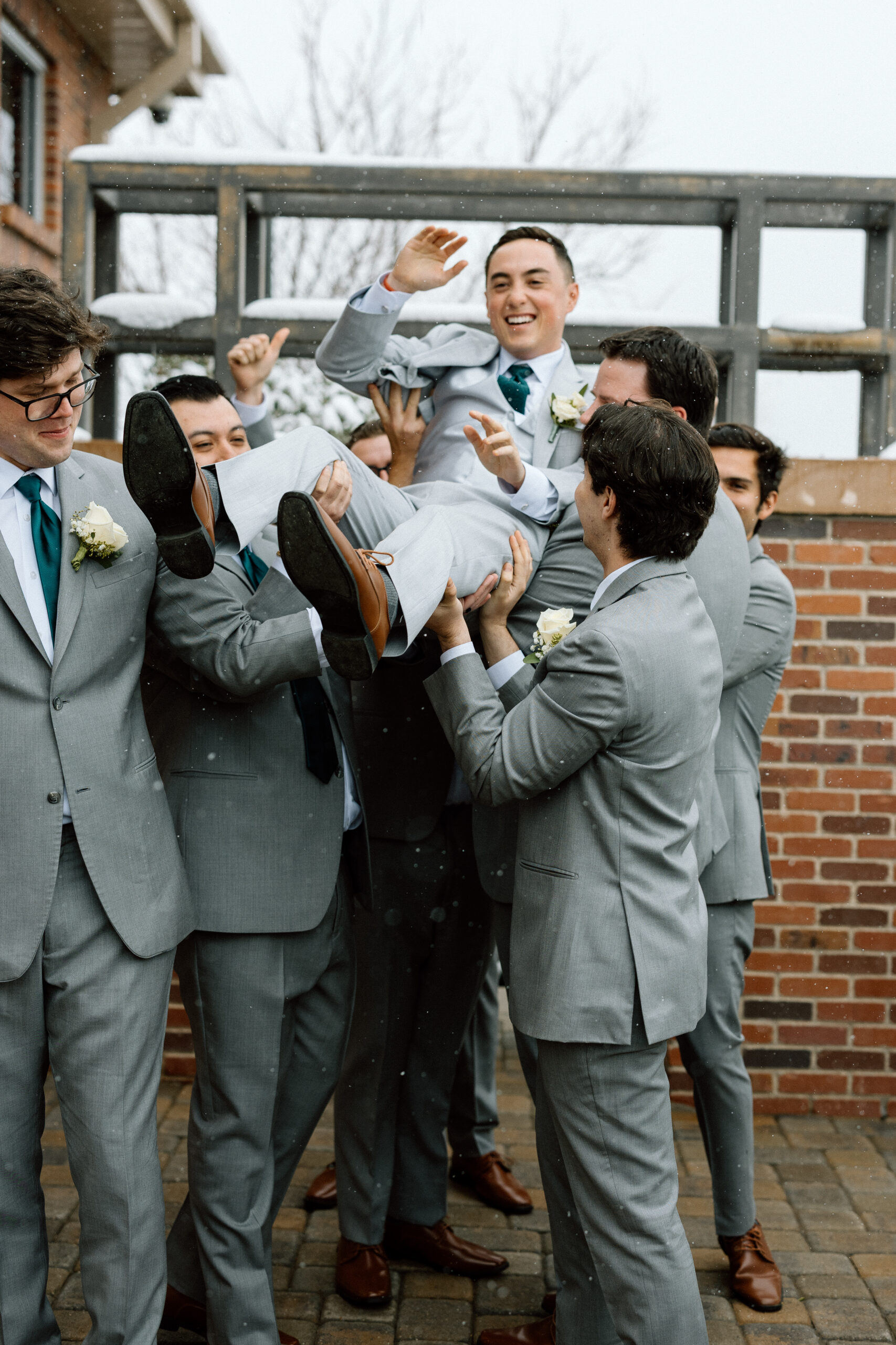 Fun, candid groomsmen photos in Denver.