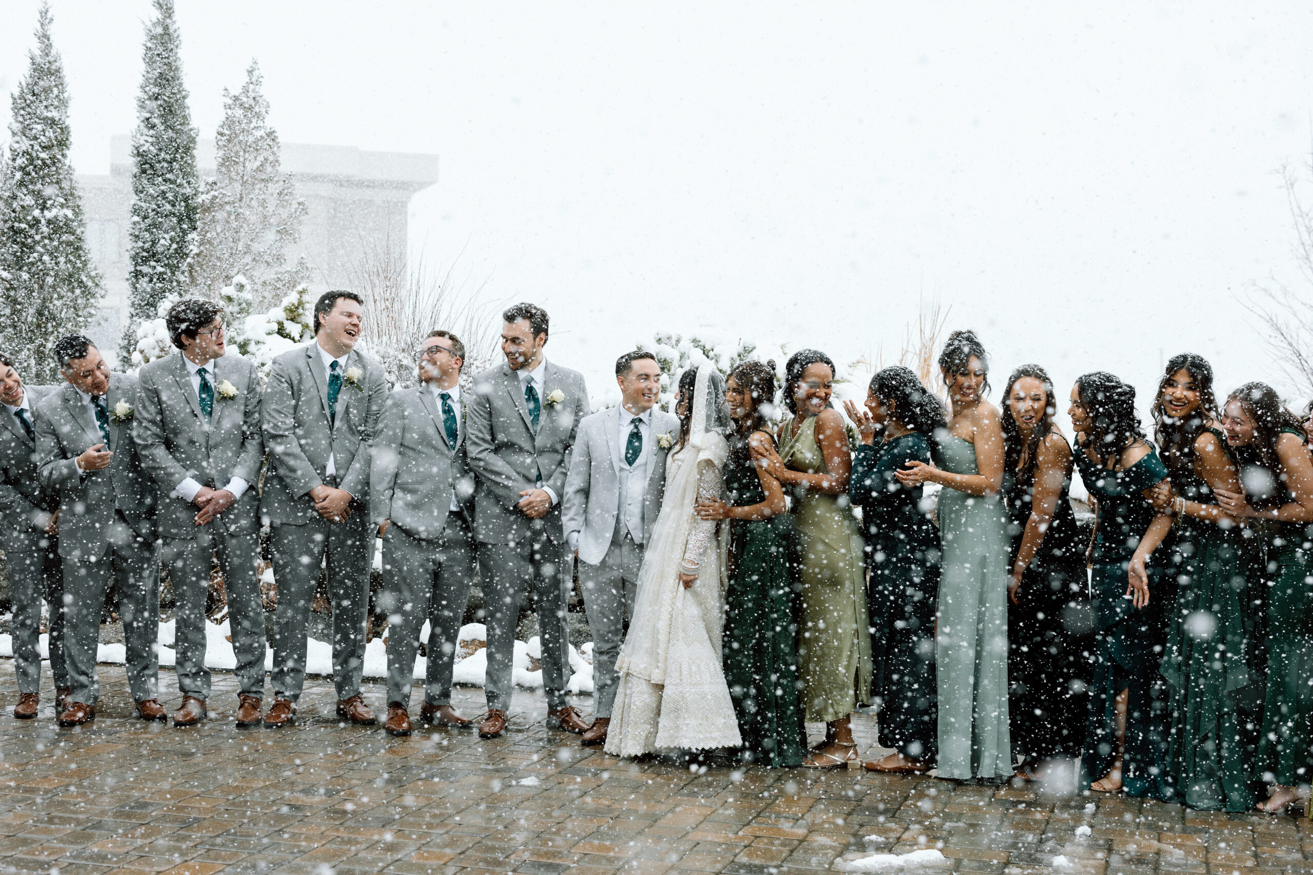 Creative wedding party photography ideas for snowy Denver weddings.