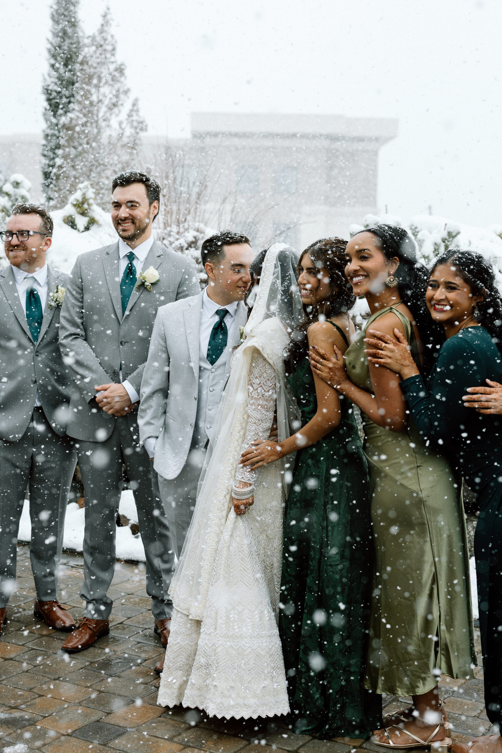 Creative wedding party photography ideas for snowy Denver weddings.