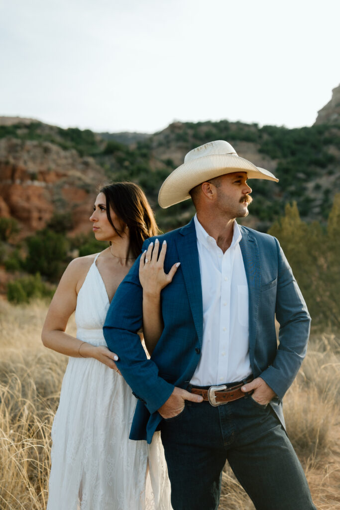 Classic engagement portraits with rich sunset tones in Palo Duro Canyon