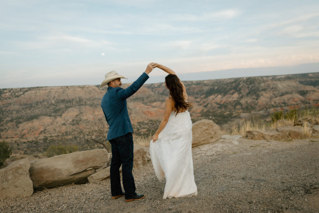 Palo Duro Canyon wedding photographer capturing western-inspired couple at sunset