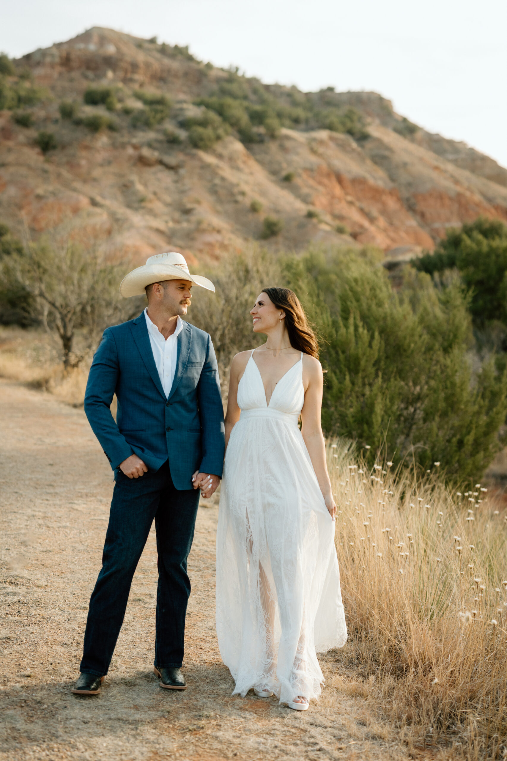 Timeless wedding portraits in Palo Duro Canyon with bold West Texas colors