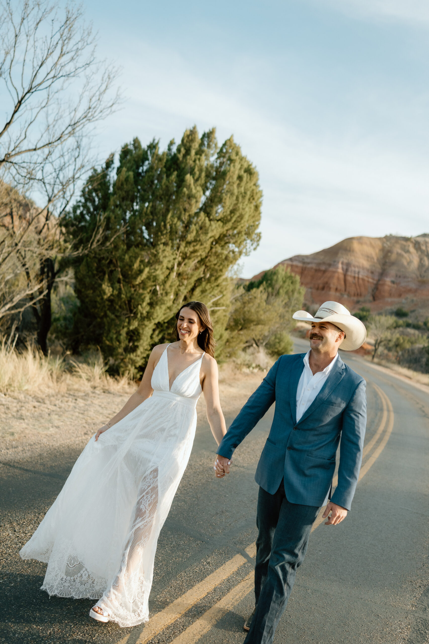 Timeless wedding portraits in Palo Duro Canyon with bold West Texas colors