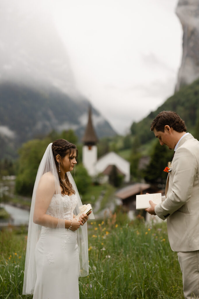 Couple exchanging vows during an intimate Lauterbrunnen elopement