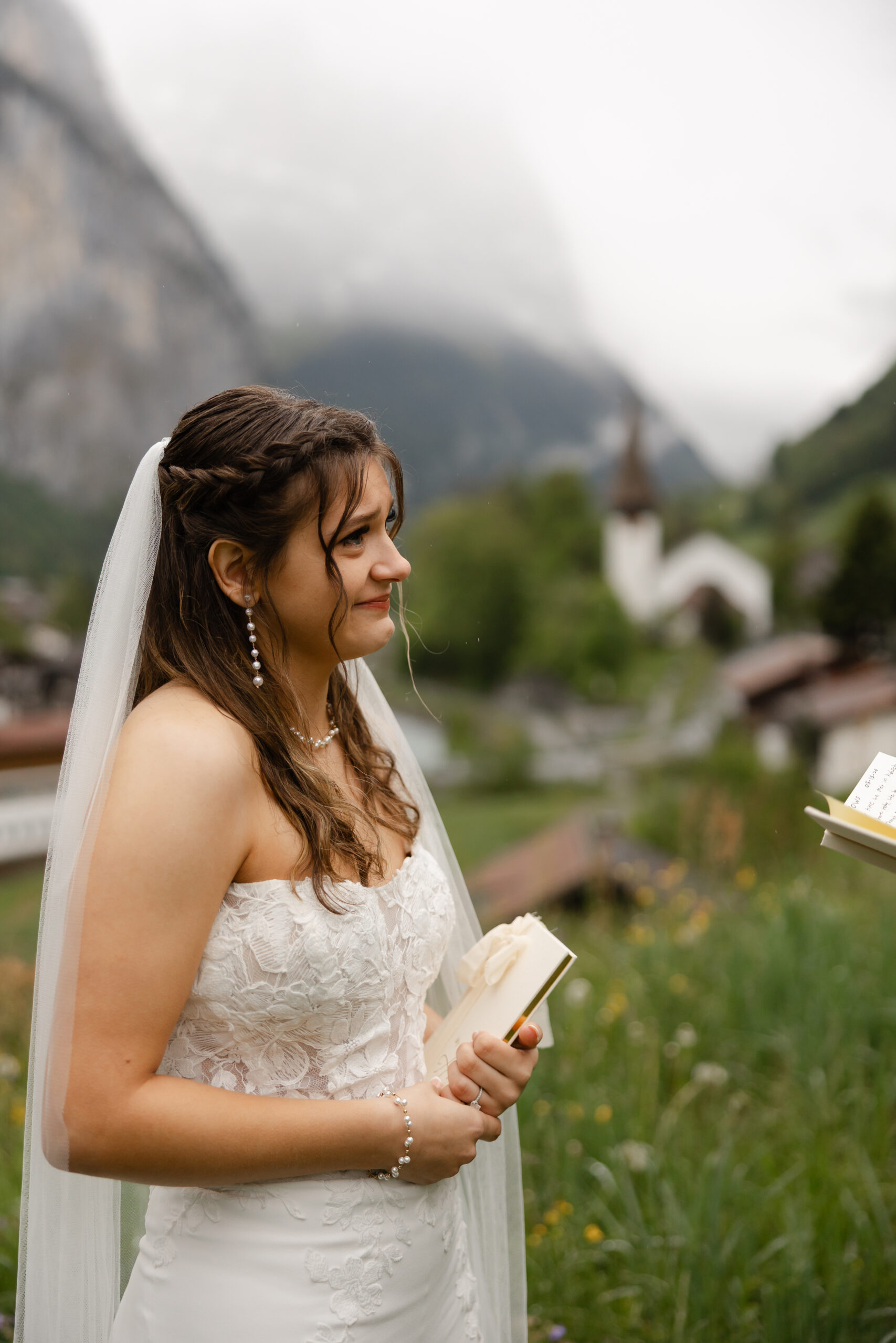 Couple exchanging vows during an intimate Lauterbrunnen elopement