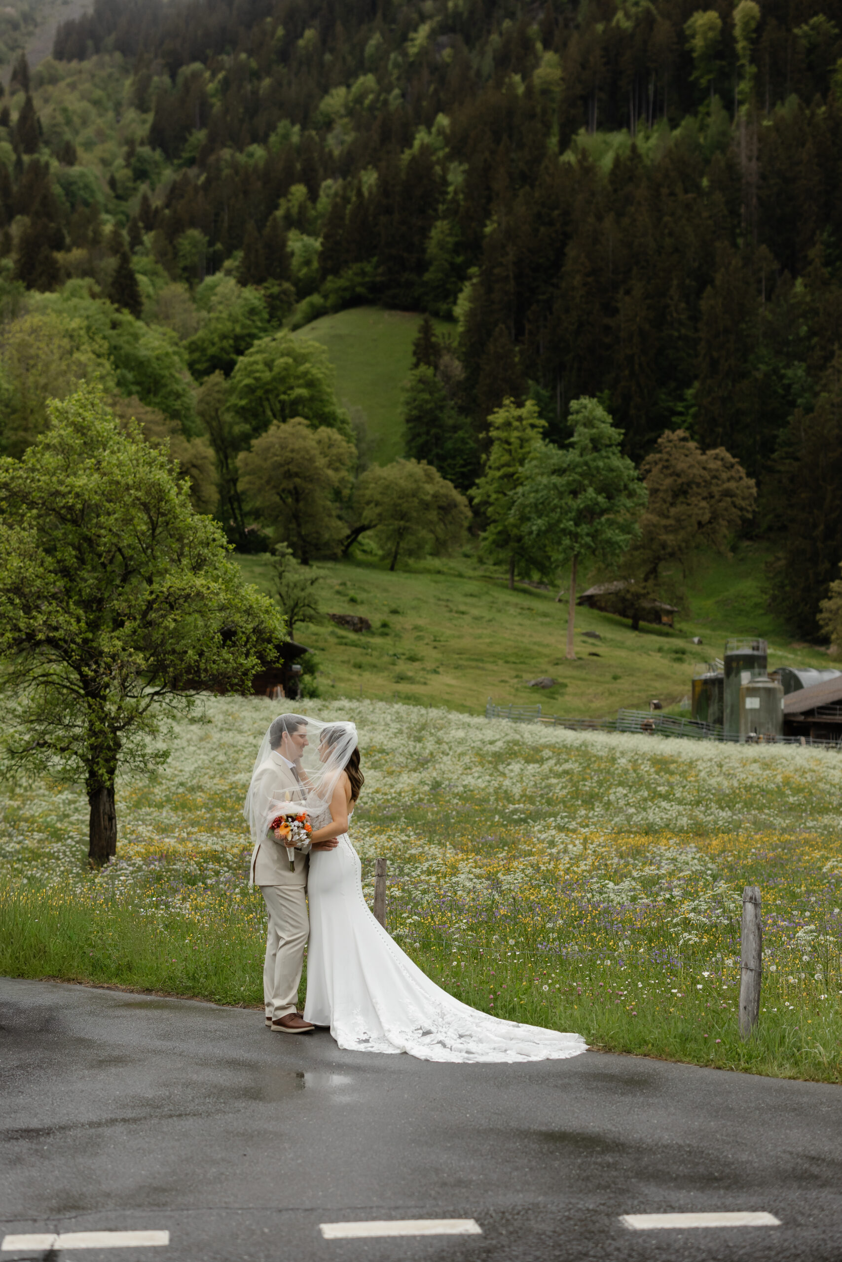 Bride and groom exploring Grindelwald during their destination elopement