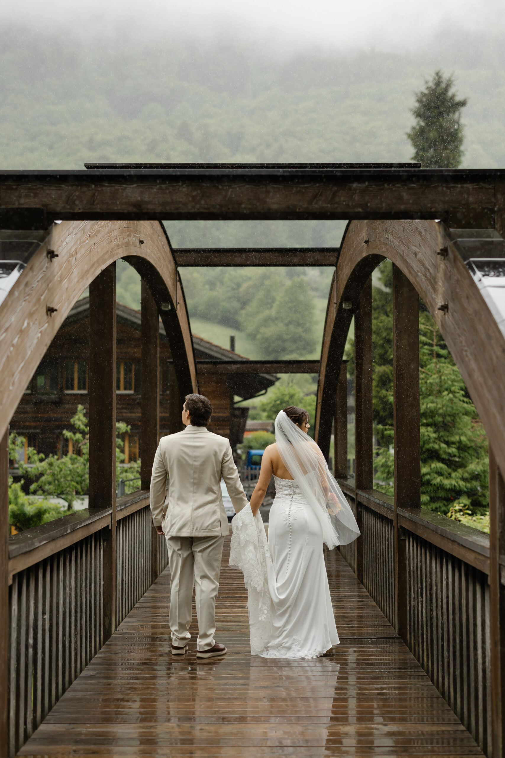 Bride and groom exploring Grindelwald during their destination elopement