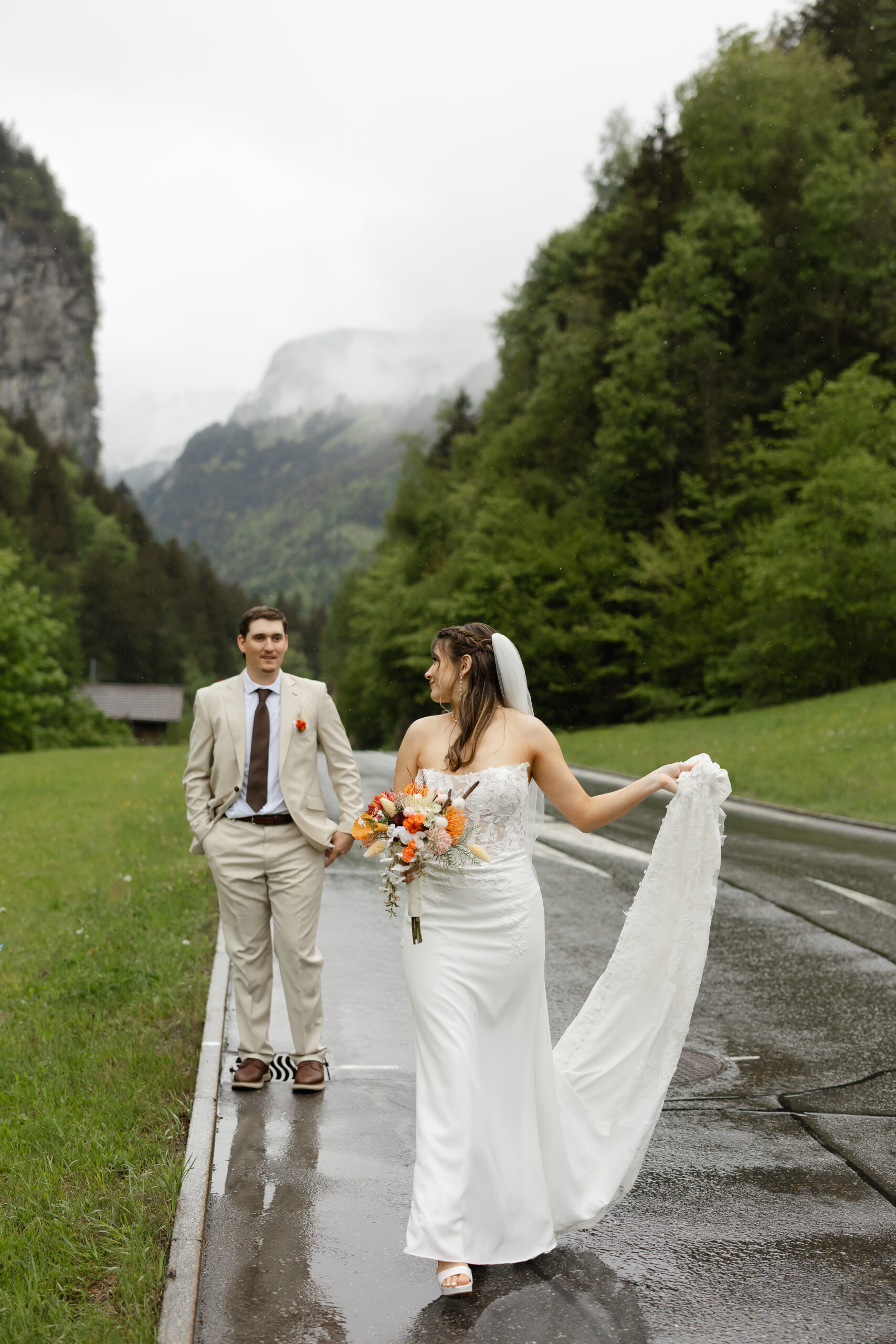 Bride and groom exploring Grindelwald during their destination elopement