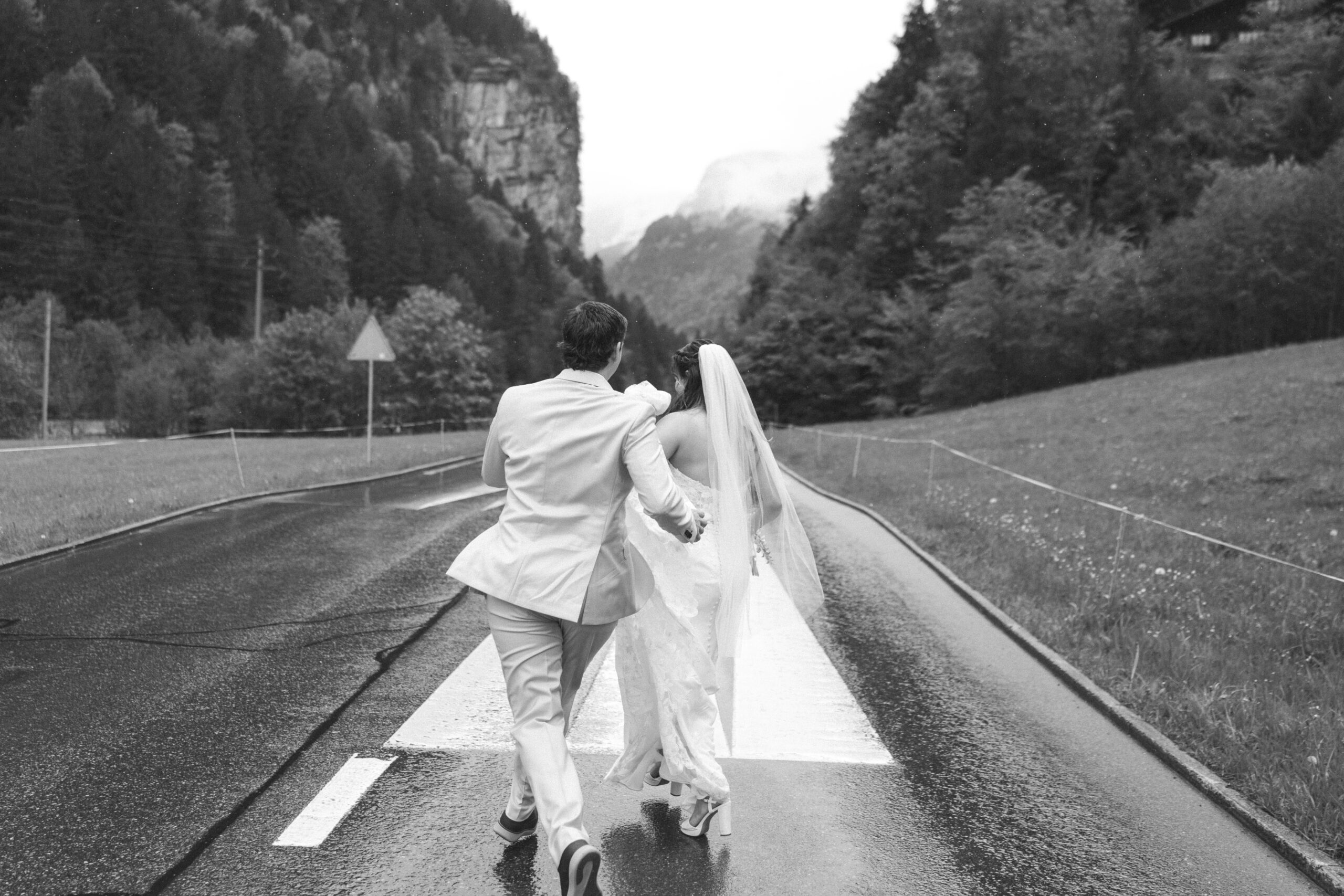 Bride and groom exploring Grindelwald during their destination elopement
