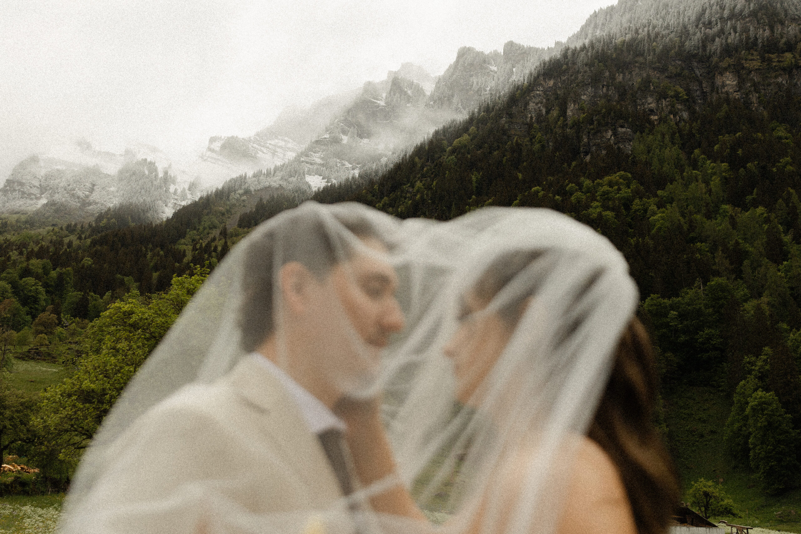 Bride and groom exploring Grindelwald during their destination elopement
