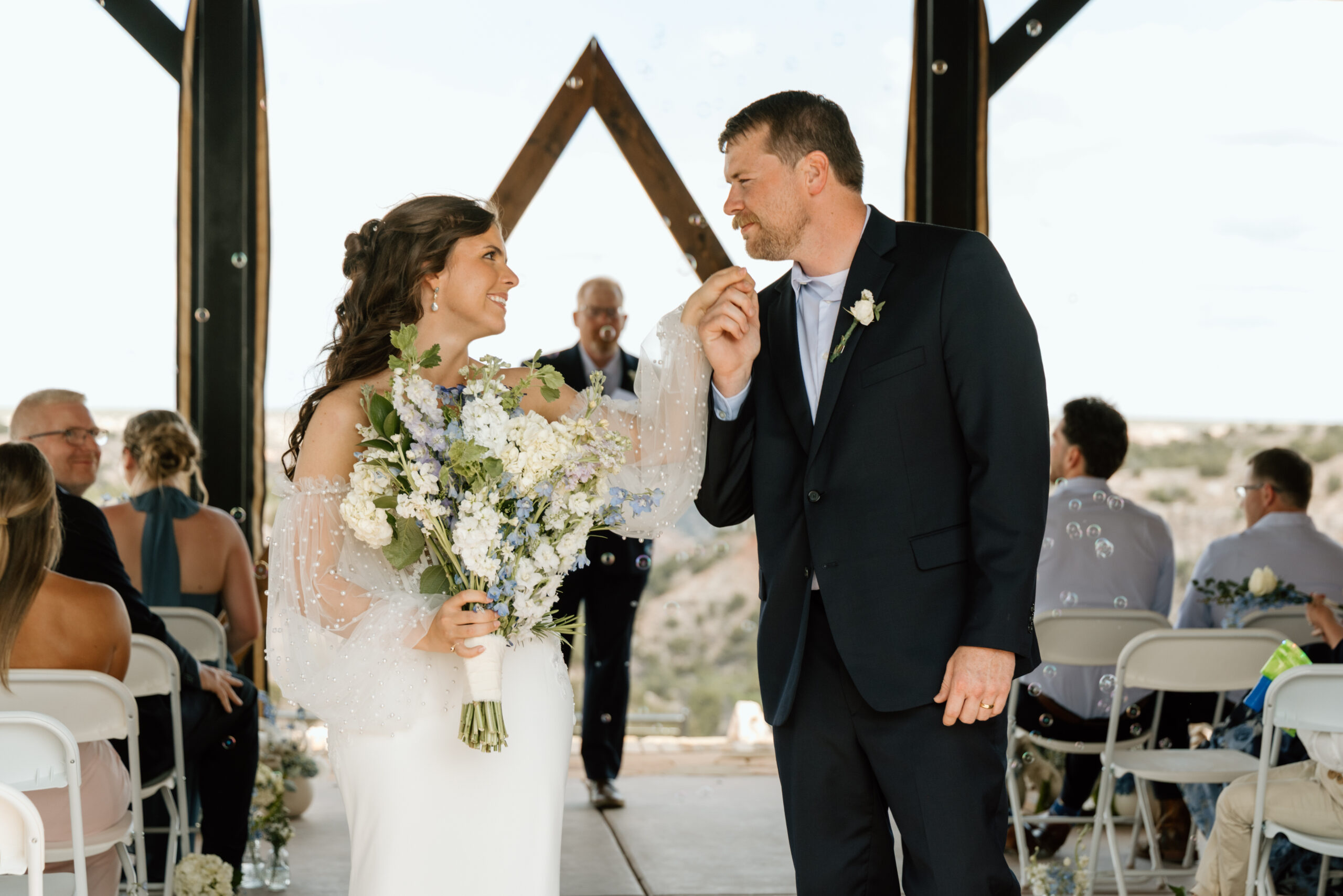 Wedding ceremony at Tres Vientos overlooking Palo Duro Canyon near Canyon Texas