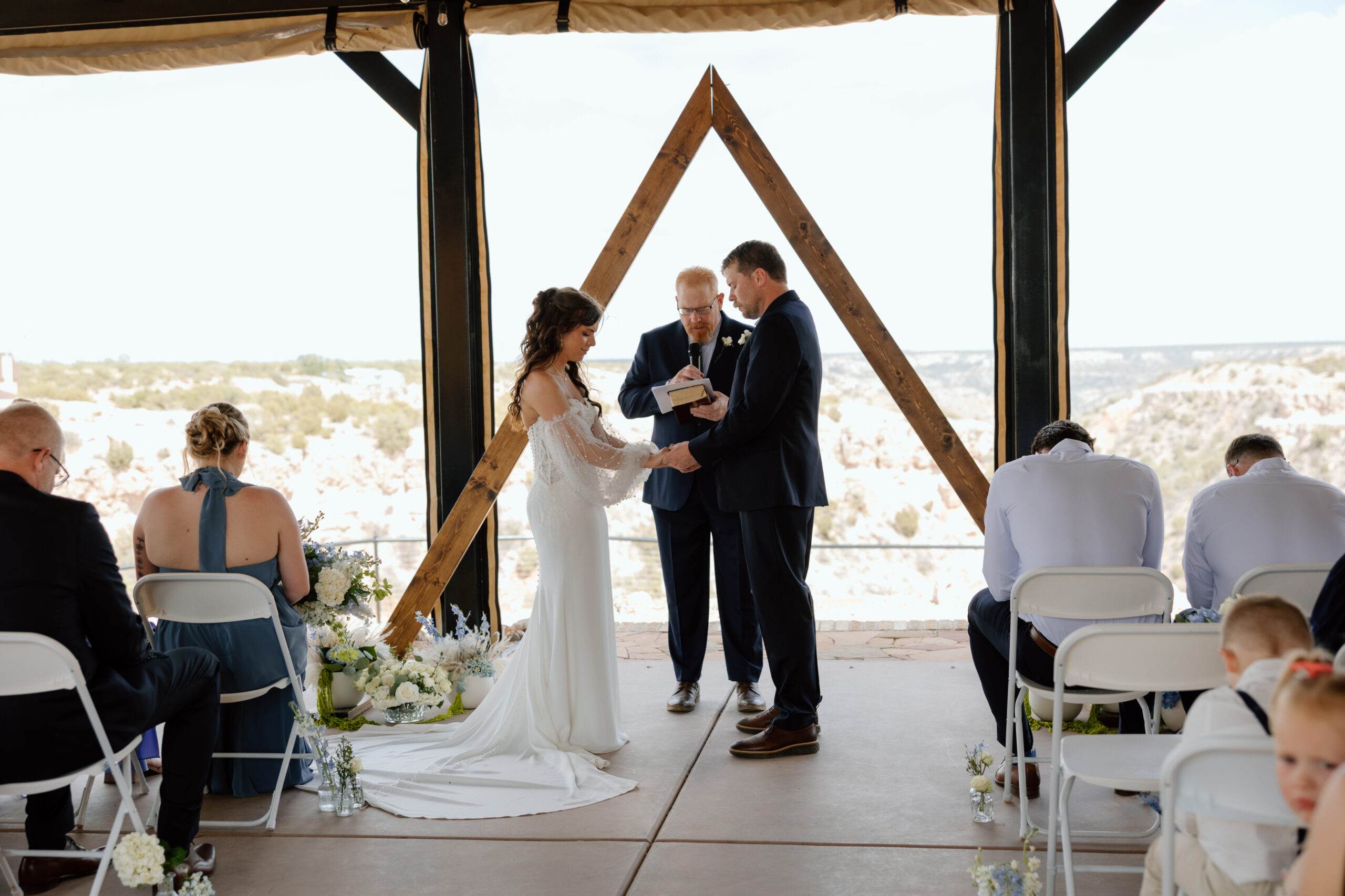 Wedding ceremony at Tres Vientos overlooking Palo Duro Canyon near Canyon Texas