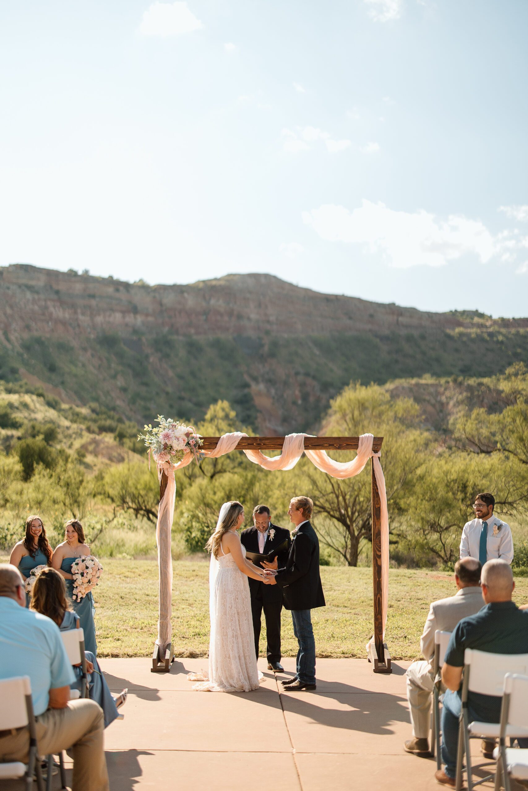 Outdoor wedding ceremony at Mack Dick Pavilion in Palo Duro Canyon